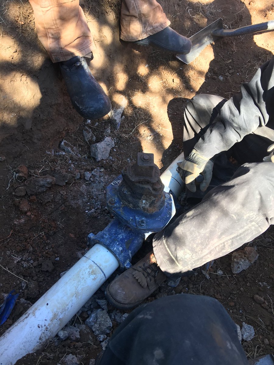 CalebBrysonPoe's tweet photo. Trying to fix main line valves before charge up. Gotta love concrete! https://t.co/ODvFzBtaPv