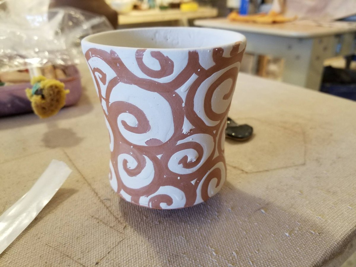 Sara's swirl cup, glazed and ready for firing.  Sara teaches our kids class, which has plenty of room left for the upcoming spring semester.  We are welcoming kids as young as 6 to join the class and learn about clay! indigofirestudio.com/classes