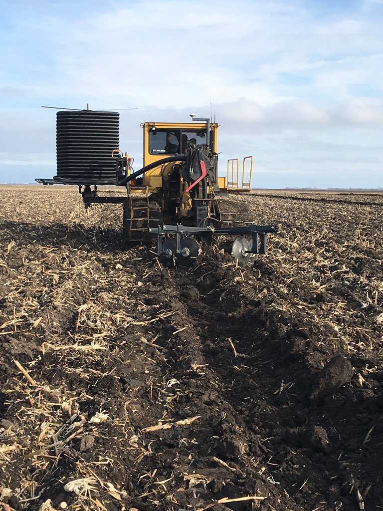 AGofTheWorld's tweet photo. Here is a look at the trench after the Bron plow goes through.  The plow is a much faster machine. We have special boots that will lay up to 18” tile. #BETiling18 @tilebride https://t.co/A7KqekBPPX