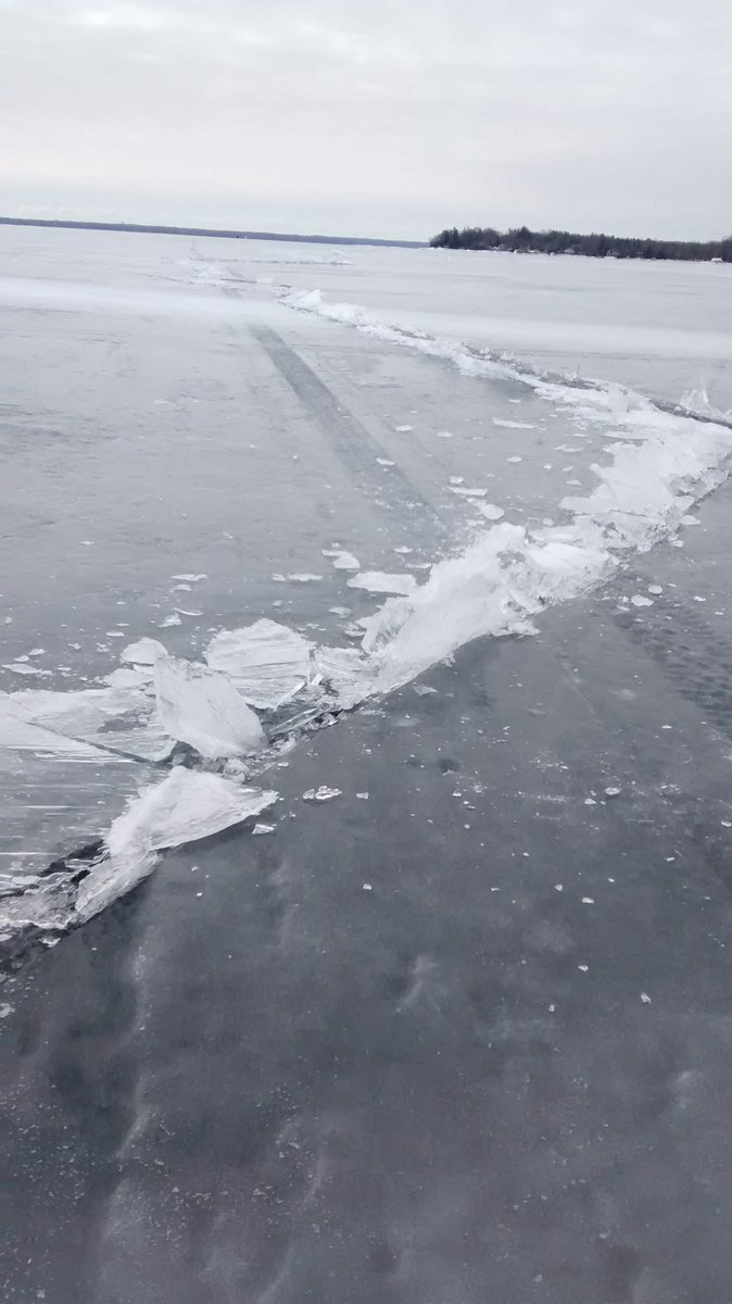 Early morning fishing on Lake Simcoe. Still about 16" of ice. Keeping warm and warming lunch. Hope that crack doesn't open up. No fish!