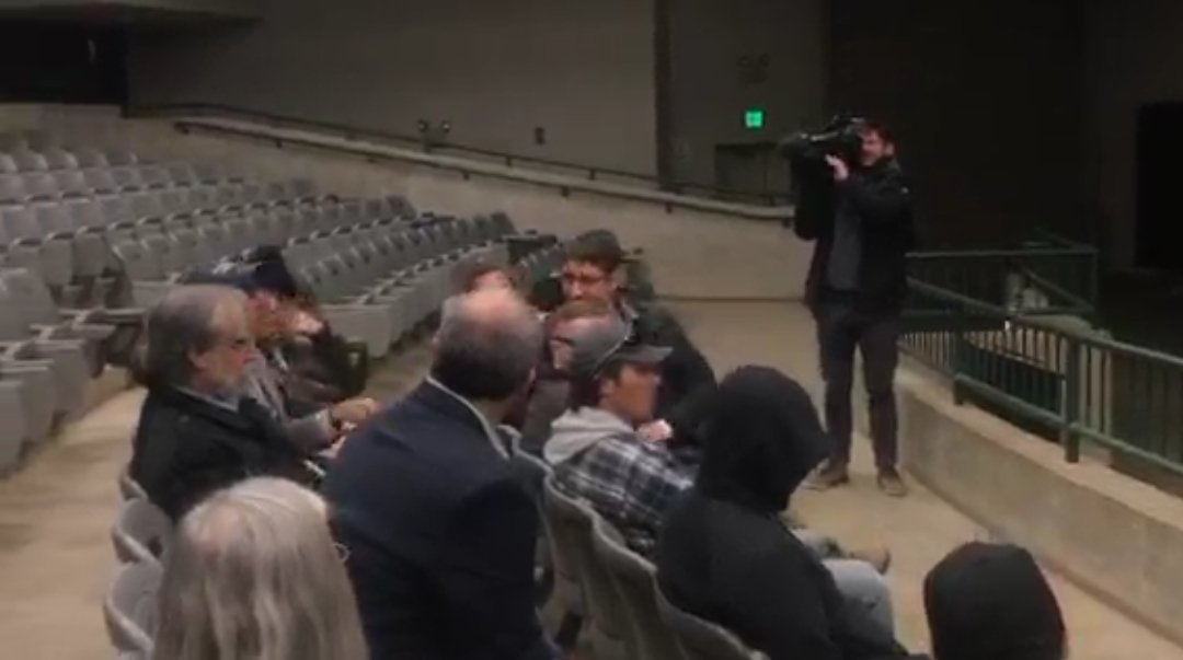 DavidHarns's tweet photo. Sad man in a suit speaking to a teeny tiny audience in the Livestock Pavilion. https://t.co/hSOHW3Hz9s