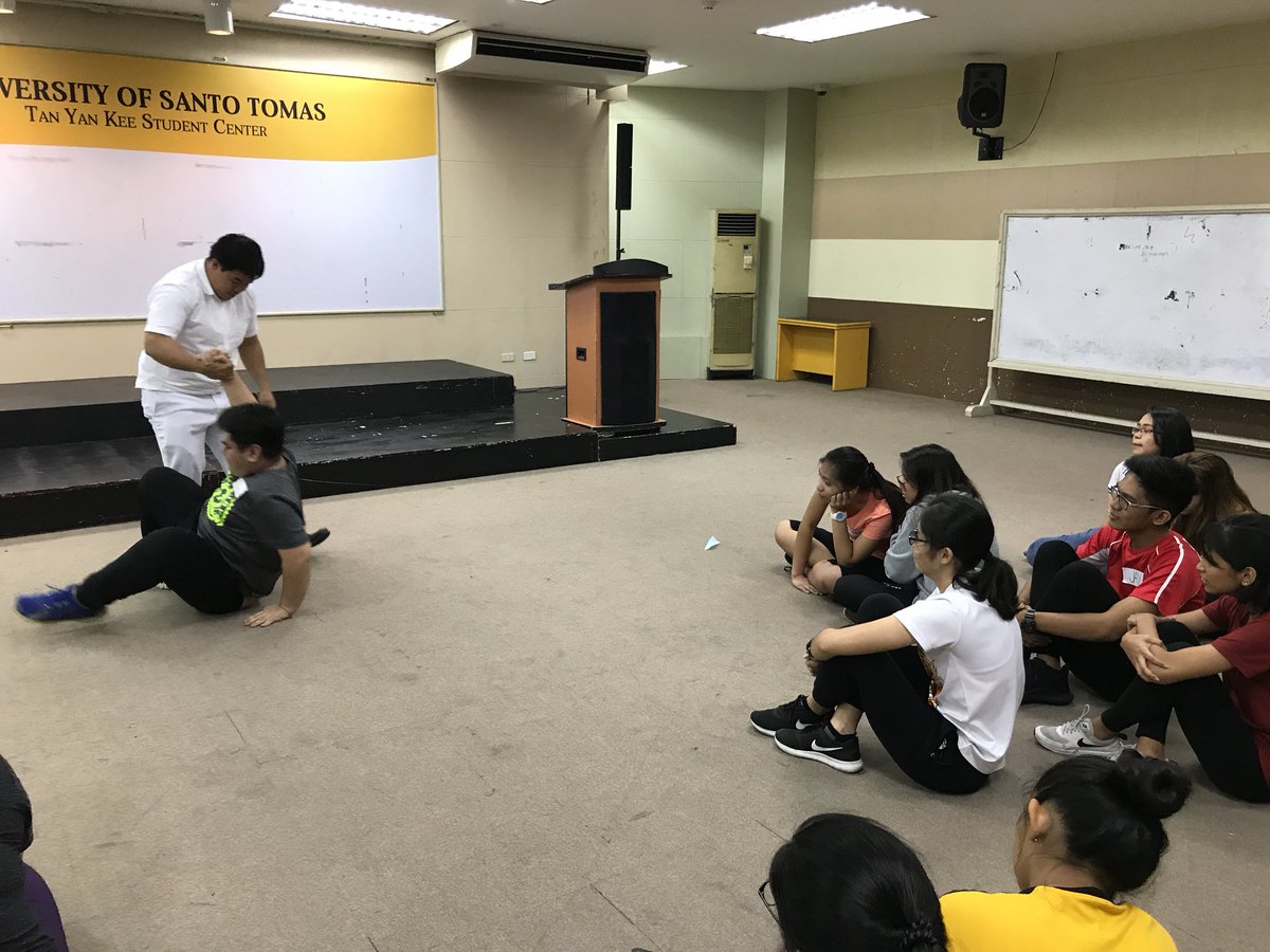 ust_hiraya's tweet photo. “Hit high then low” Dr. Quidlat of UST FMA showing students how to take down an assailant using self-defense
#GritAndGrace
#HERevolution
#USTWomensWeek2018
#ItStartsWithUs https://t.co/Ug4svcv2D4