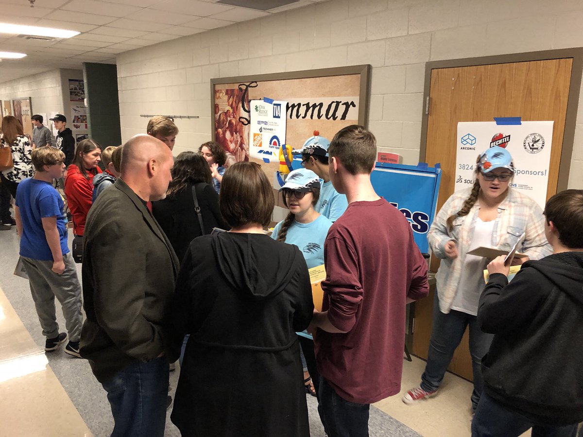 RoHAWKtics3824's tweet photo. Veteran members having a blast talking to potential members at Eighth Grade Night! Come by our table if you’re interested in joining our team! #omgrobots https://t.co/cdIaTjs8aG