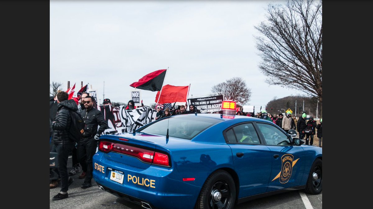 cj_weiss's tweet photo. Some pictures from today's protests against Richard Spencer speaking at MSU. @thesnews https://t.co/mSwV87L6C3