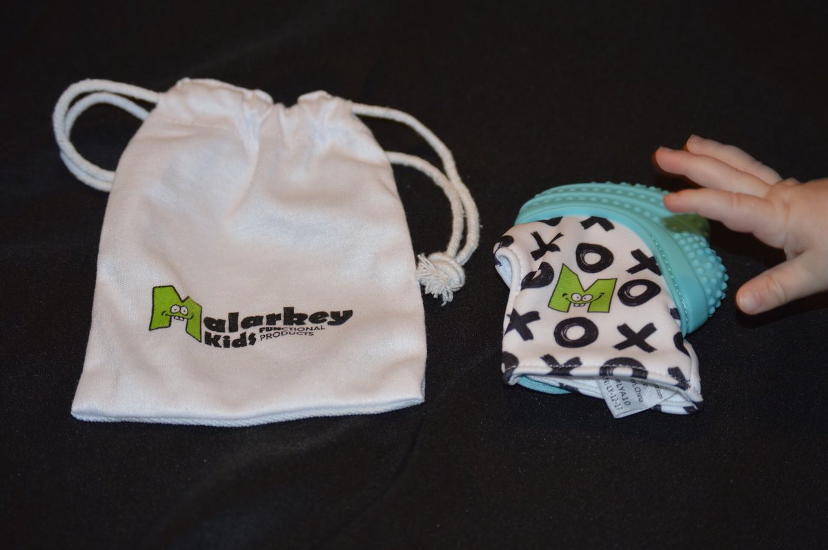 Taylor_Bitchhhh's tweet photo. We finally got our #munchmit in the mail!! & as you can tell Grace is so excited! She couldn’t even wait 5 seconds for me to take a picture of it lol! & it came just in time for her 2nd tooth to poke through! #malarkeykidsbrandrep #ORIGINALmunchmitt #mominvented @malarkeykidsinc https://t.co/CbsHMdM232