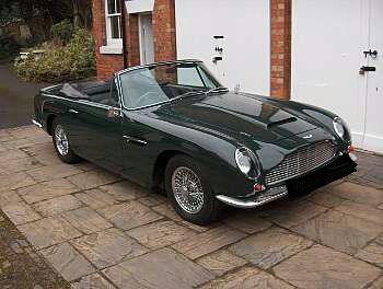 JamesRock0069's tweet photo. @ElioElio1962 @brandi_love Mine : 1967 Aston Martin DB6 Vantage Volante Convertible... And @brandi_love https://t.co/gUMQTxuyN0