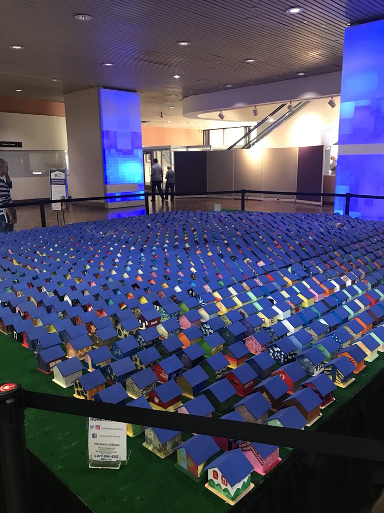 MayorBovo's tweet photo. On display at County Hall #RoofsRising a project of over 1000 small homes painted by community activist and leaders to support @HomelessMiami the trust makes it a mission to help those who need a hand up. #HomelessMiami https://t.co/Wq2gtf34XP