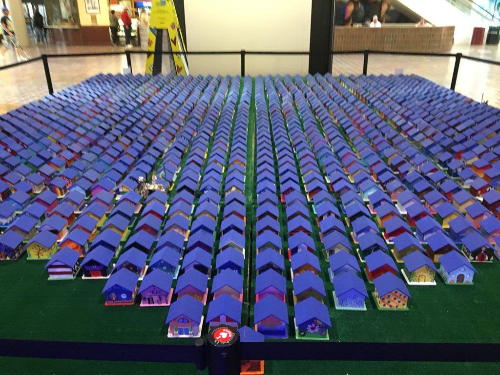 MayorBovo's tweet photo. On display at County Hall #RoofsRising a project of over 1000 small homes painted by community activist and leaders to support @HomelessMiami the trust makes it a mission to help those who need a hand up. #HomelessMiami https://t.co/Wq2gtf34XP
