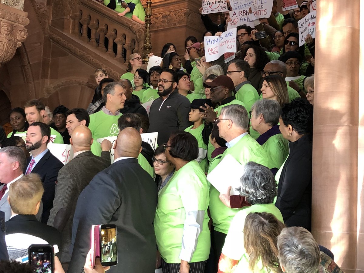 altochulo's tweet photo. NOW in Albany: Counter-protestor asks @Airbnb executives at their press conference why they won’t stand on the side of working families. #RealAffordability https://t.co/8CbgkSOy7S