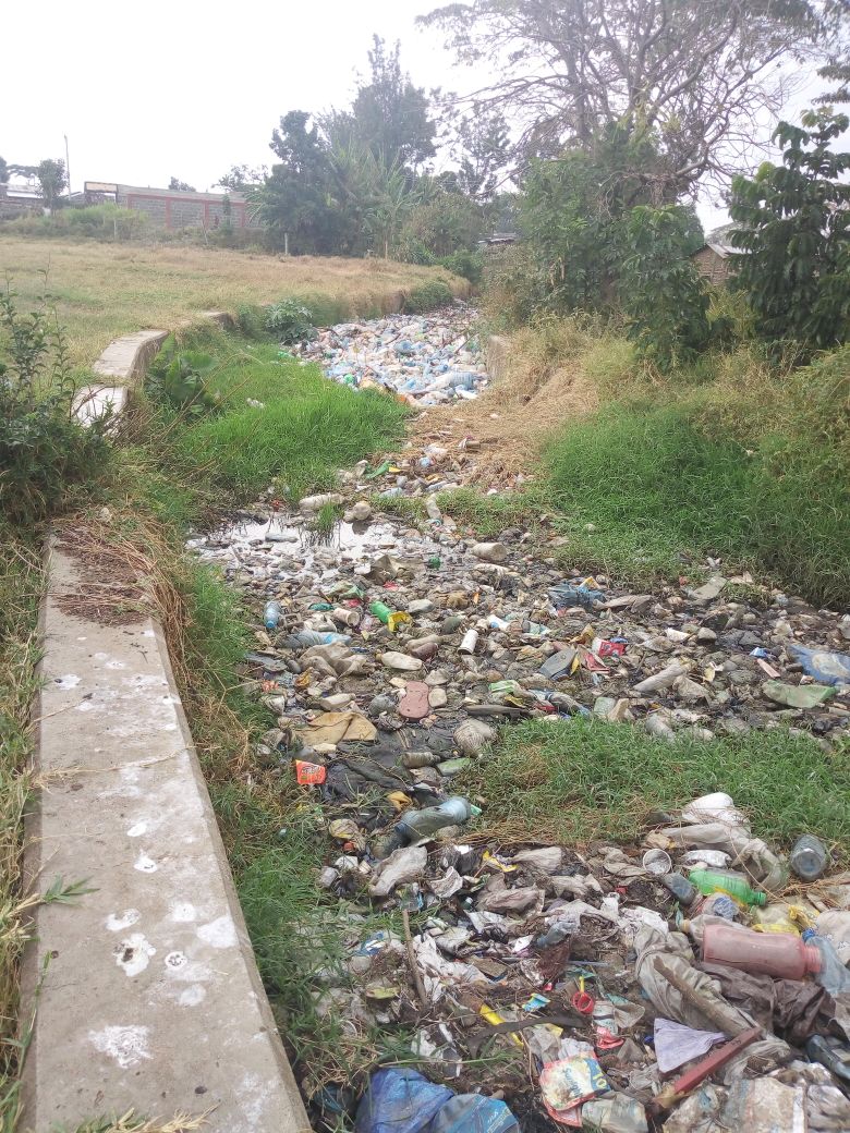 Plastic bottles inside storm water retention pond at Nakuru sewerage treatment plant  .Photos by Kirgit Edd #RethinkPlastics #PlasticRevolution