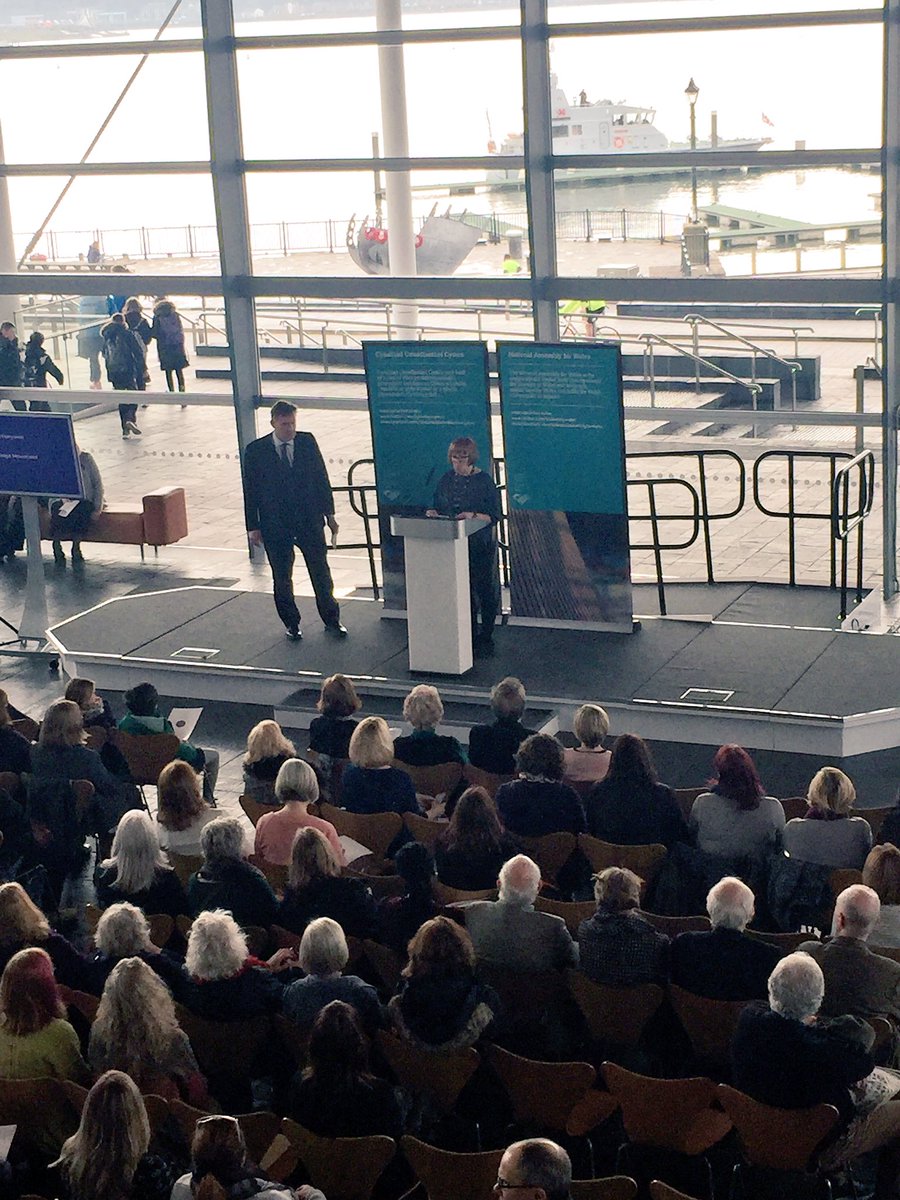 CuratorElen's tweet photo. One of those memorable days at the office. We had a fantastic time sharing and discussing our #suffrage collection at the Senedd today. What a setting to reunite the two Cardiff banners! #StillMarching #IWD #emotionalobjects #MakingHistory https://t.co/mHEk9JDcFn