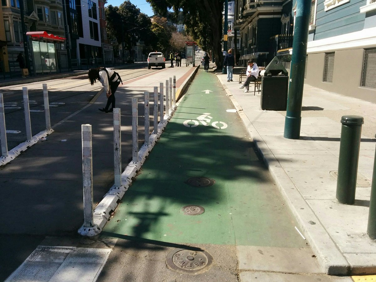 Duboce W at Church. 5'11" at the posts, 6'1" at the island. No drivers use this.