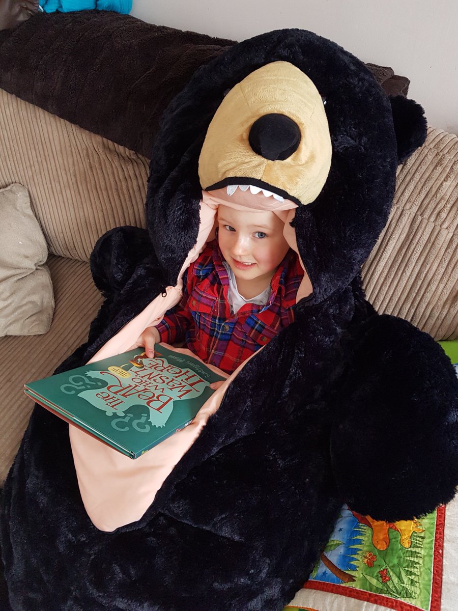 WHPrimary's tweet photo. Lucas was so engrossed in his new book that he didn't realise his picture was being taken.

The best way to enjoy a snow day is to snuggle up in a bear sleeping bag and read a book #funtimereading https://t.co/68igahVR3n