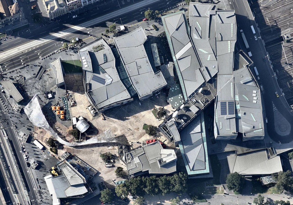 NearmapAU's tweet photo. Take a look at our new survey of #Melbourne, VIC. We covered from Truganina to Kilsyth, capturing this crystal clear image of @FedSquare #photomaps #fedsquare https://t.co/sSZmZJA3bS