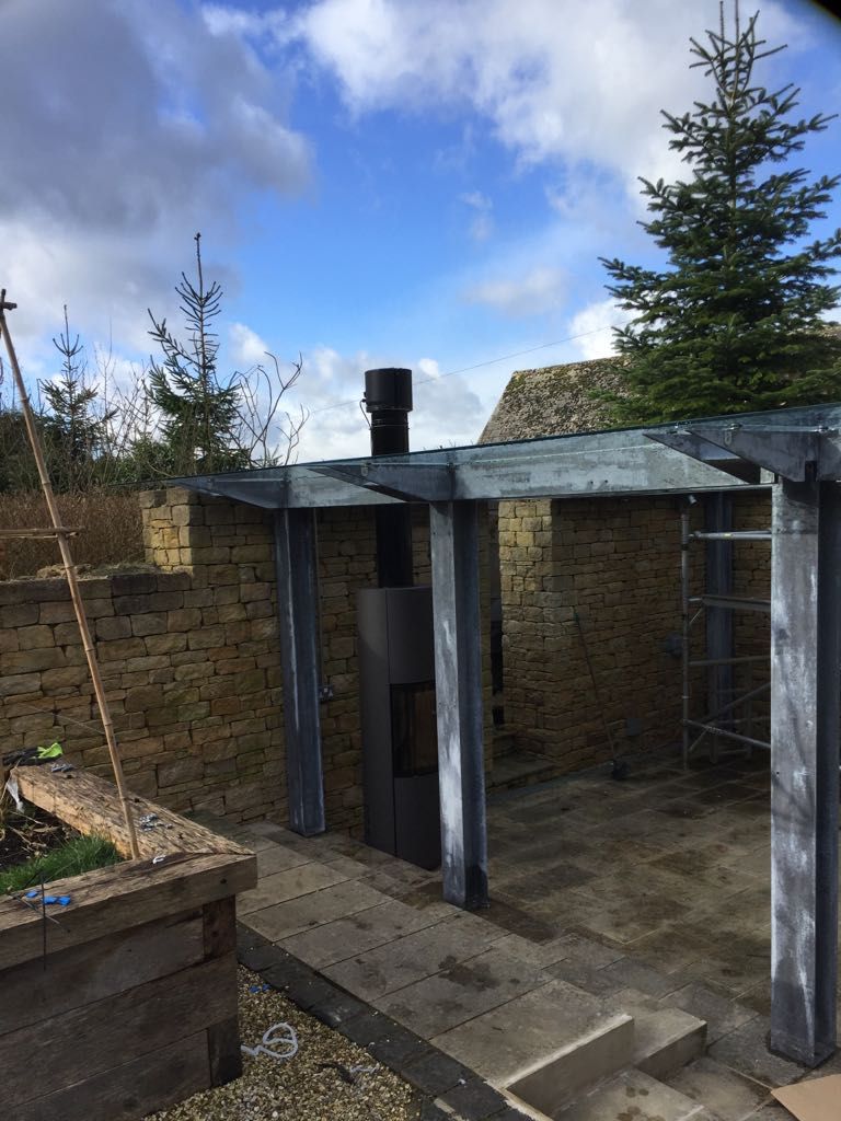 coriniumstoves's tweet photo. Some photos of a recent installation of a Spartherm Passo L in titan paint in a unique modern glass roof garden pagoda #CSinstallations #CoriniumStoves https://t.co/gltlD8KeBr