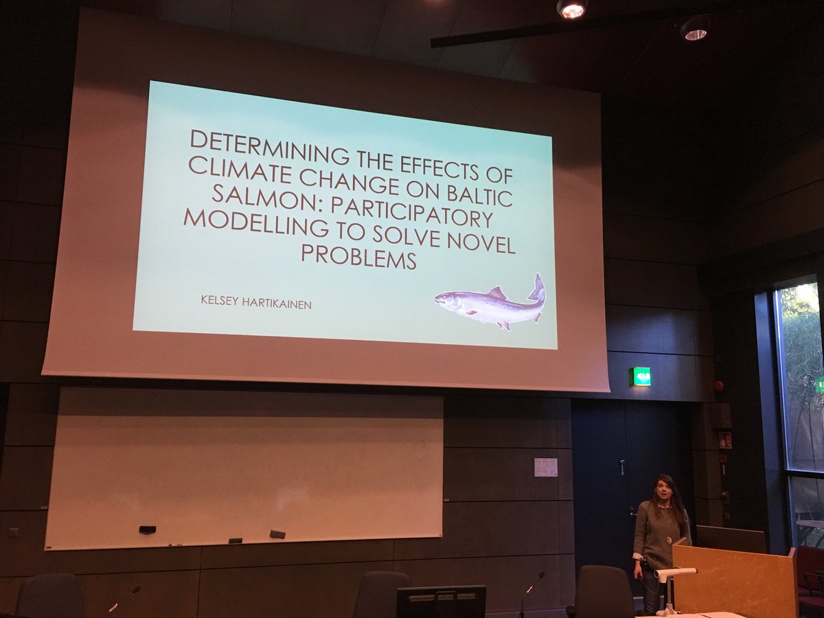 springsymposium's tweet photo. Kelsey Hartikainen is telling about determining the effects of the climate change on Baltic salmon by using stakeholder participatory modelling #SpringS18 https://t.co/Fq6u3DhSmx