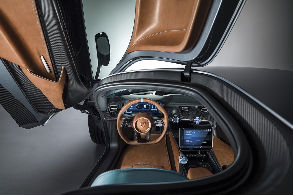 motorionline's tweet photo. #Rimac #ConceptTwo: a #Ginevra si scopre la #supercar elettrica che corre fino a 412 km/h [FOTO e VIDEO] https://t.co/zvVg5oyOkd #hypercar #RimacConceptTwo #GIMS18 #GIMS #GIMS2018 #GIMSSwiss2018 https://t.co/i77tSqy1GH