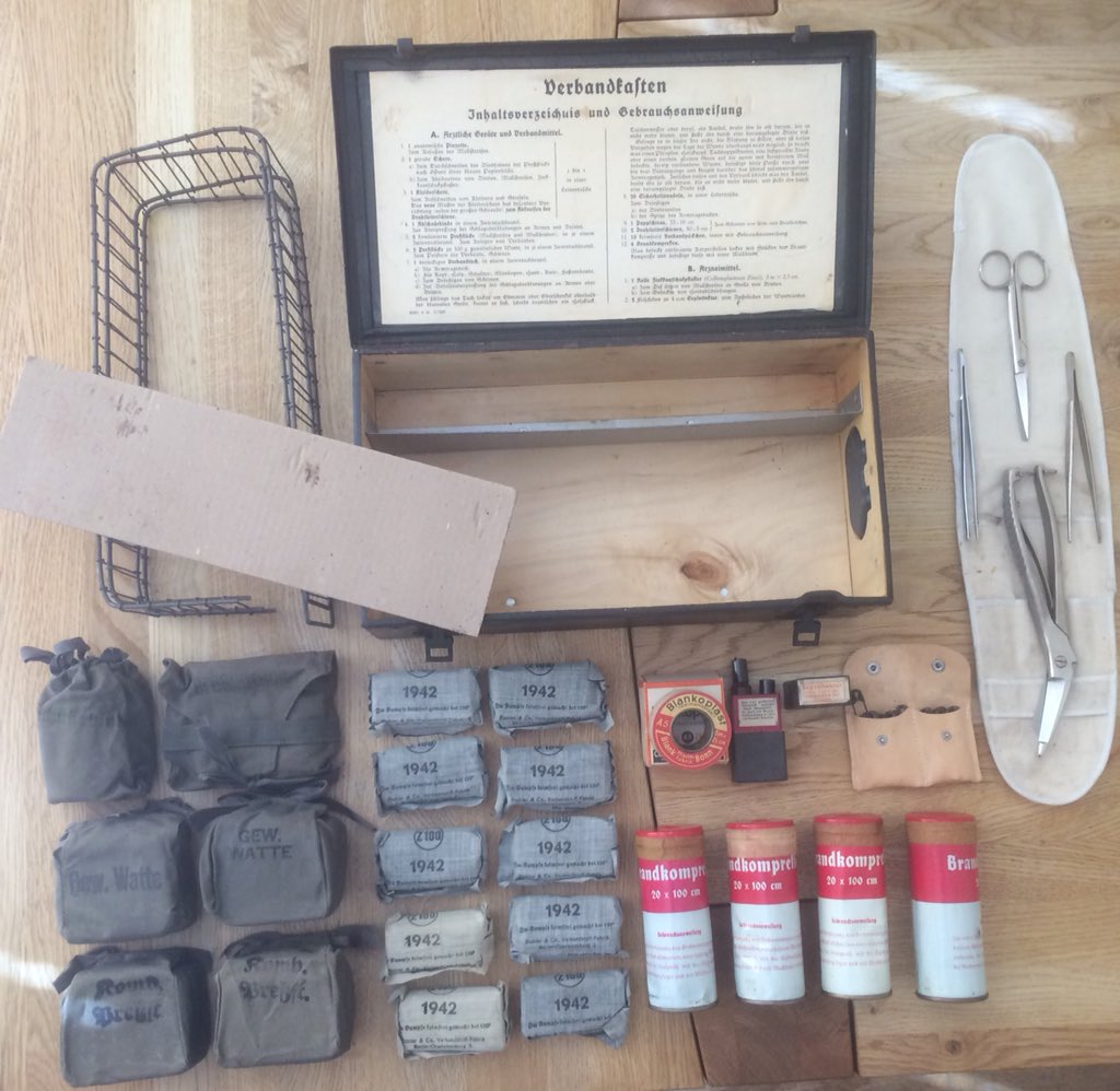 Finally, we have a canvas pouch containing Verbandkasten specific clothes shears & standard straight scissors and tweezers as per Sani.The design, unsurprisingly became less sophisticated as the War progressed, w/ cheaper construction/less material. The last were wooden /6
