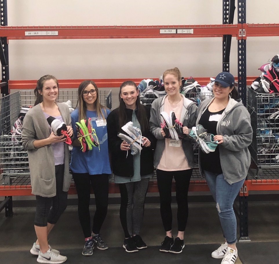 BoltPR's tweet photo. Our #BoltTX team had the best time volunteering with @Buckner_Shoes for Orphan Souls, providing new shoes and socks to orphans and vulnerable children throughout the world. As an agency, we’ve committed to giving back to our local communities. #BoltBack https://t.co/1tAzepzr0G
