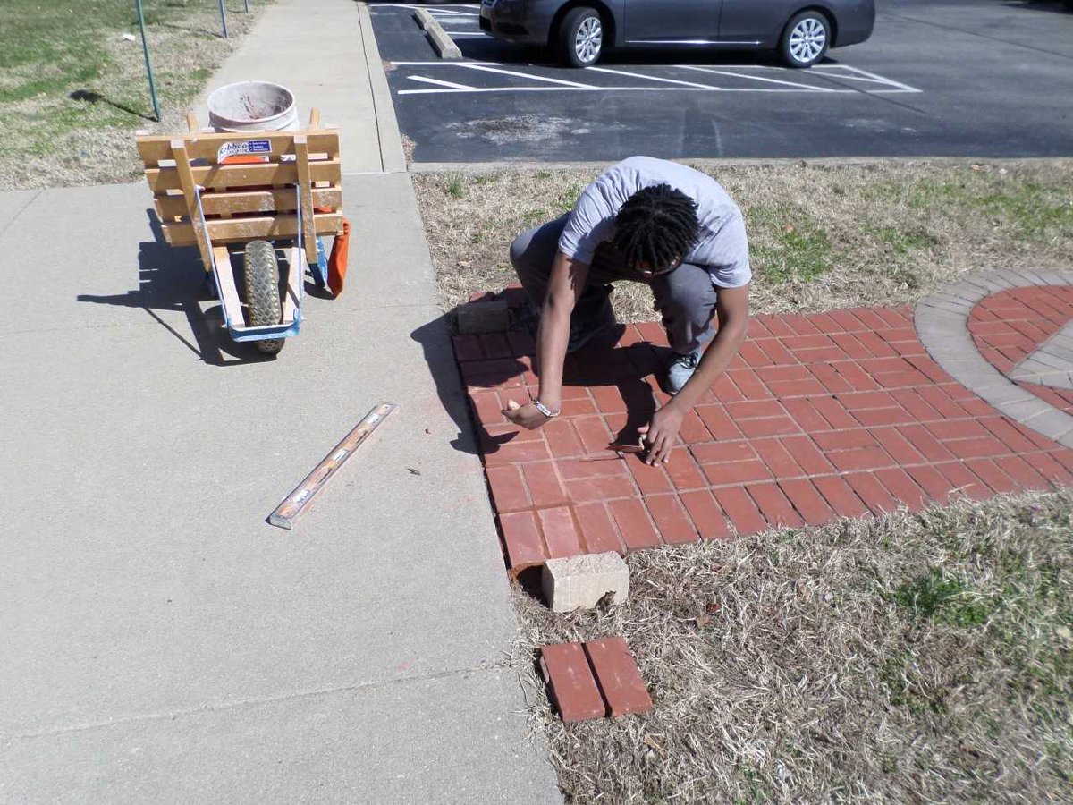 LouisvilleDayHS's tweet photo. This LDHS masonry student applied his classroom learning and repaired the front walkway on campus! @SacSchools  @JCPSKY https://t.co/7hmTVWyf5S