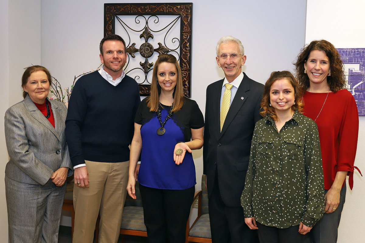 TarletonPrez's tweet photo. Dr. Jamie Borchardt received a well-deserved core value coin for serving as doctor, family, mother &amp; counselor during a student medical emergency. Thank you for your service ethic #TexanWay https://t.co/w6GdYdsD8N