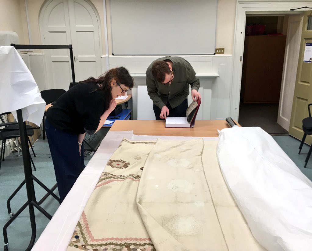 ArtinNorwich's tweet photo. RT @SteveMillerNMS: Ruth & Andy preparing for this weekend’s #TextileTakeover event @NorwichCastle. An incredible item, made of linen and cotton, was created by female prisoners as part of Elizabeth Fry’s Newgate Scheme of prison reform. #Norwich #Museums https://t.co/DZyjRPClyA