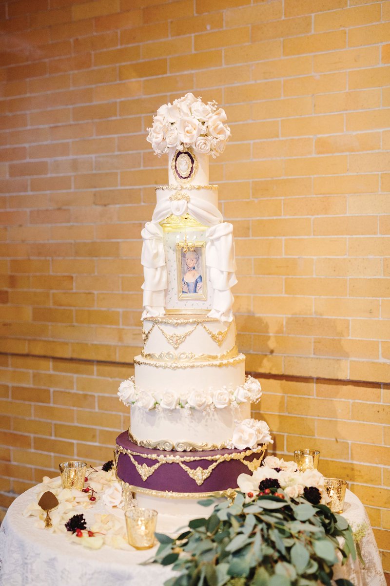 Christine, a custom cake designer, made the cake for her and husband Ryan's <a href="/lindenplace/">Linden Place Mansion</a> wedding - an elaborate confection complete with a hand-painted portrait of #MarieAntoinette. Read more about their day: southernneweddings.com/historic-rhode… #RealWeddingWednesday