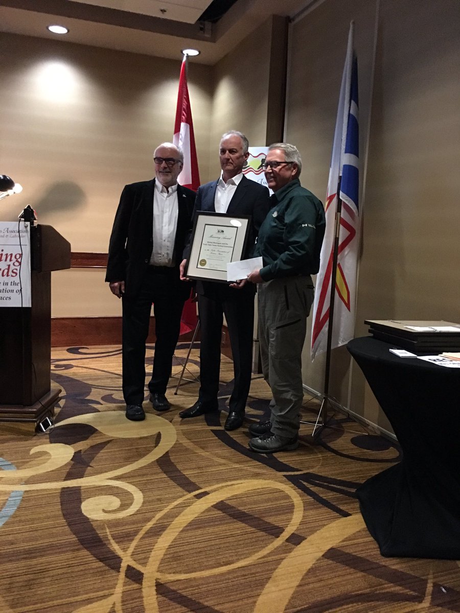 historicsitesNL's tweet photo. Accepting the award on behalf of the @TTT_Festival Committee and Shirley Montague, is Mr. Jeff Anderson, longtime festival supporter, volunteer, and performer. Mr. Glenn Keough of our partner @parkscanadanl presents the award on behalf of the HSA. #ManningAwards @TownNorrisPoint https://t.co/ePCHlK2Q6V