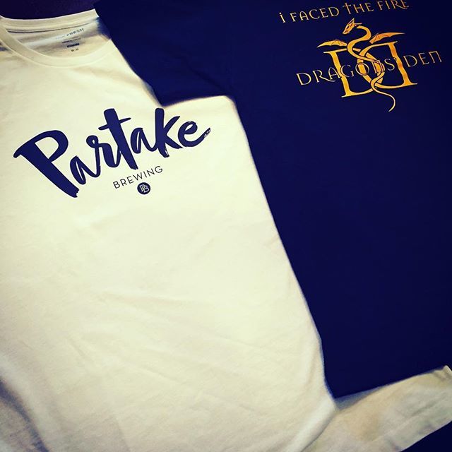 DrinkPartake's tweet photo. Faced the Dragons and got the t-shirt to prove it. Watch next Thursday March 15th on CBC TV. #cbcdragonsden #cbctv #dragonsden #saultstemarie #yyc #yyz #yvr #realitytv #startup #foodblogger #smallbusiness #businesspitch #nonalcoholicbeer #nearbeer #nabee… https://t.co/Csym0LWLYx https://t.co/0wYDJI74rb