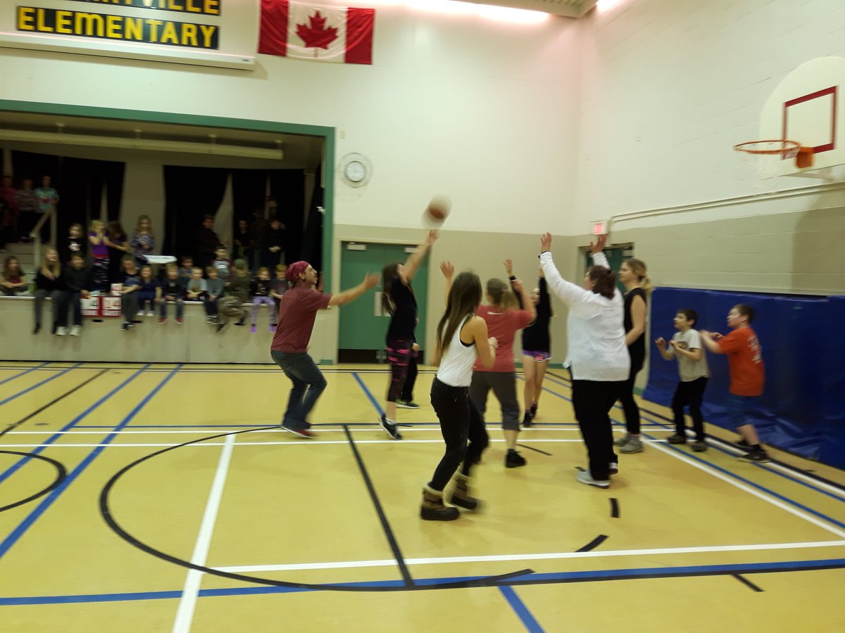 Staff and Parents vs. Students basketball game! Great job Cougars!