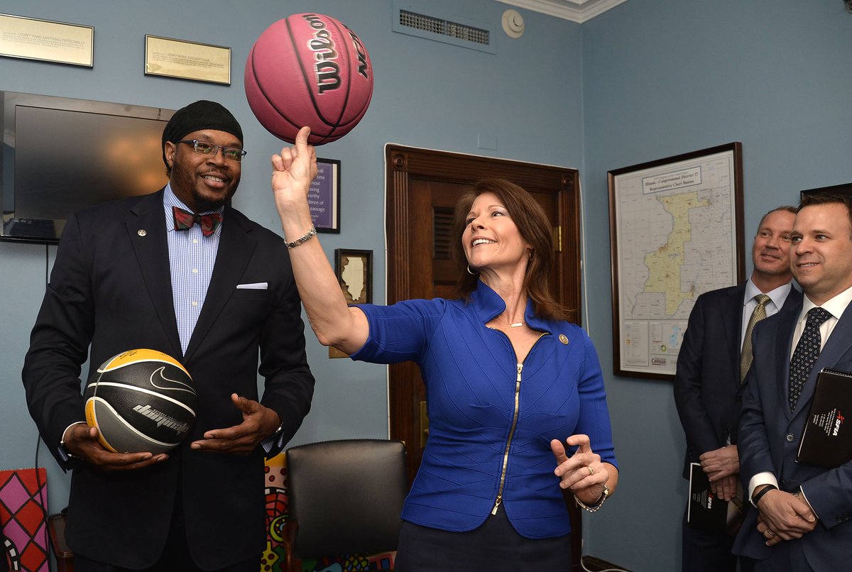 TheSFIA's tweet photo. NHTF Alert: @RepCheri of Illinois shows off her twirling skills in front of former NBA great, Sam Perkins, during his visit on Capitol Hill for the annual SFIA National Health Through Fitness Day.
#PHITDay18 #PassPHIT #lobbyday https://t.co/wMv3p8XqPD