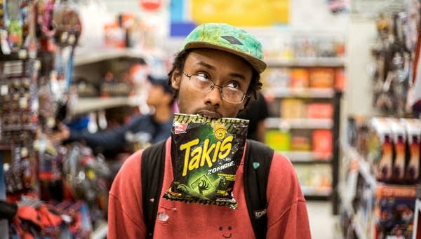 LocalCurrent's tweet photo. You Need To Know: @myafrovibrates, an ace rapper, Guitar Hero champ, and all-around "awkward fella" https://t.co/Sf4PK55qEZ https://t.co/NnrzboKkkD