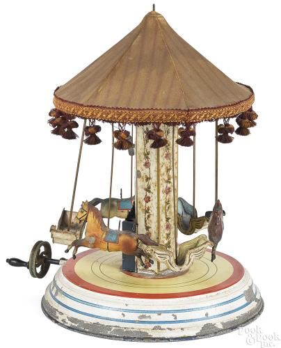 marklinstop's tweet image. this carousel is believed to be #Marklin but has some elements of Bing and Rock and Graner... curious piece!  from @pookandpook buff.ly/2Da1ejF