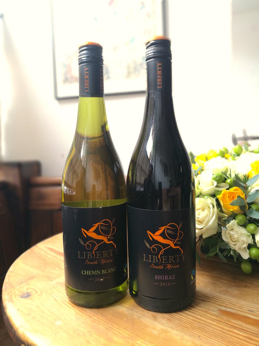 albertineLDN's tweet photo. Check out these lovely @liberty_wines from @FairviewWine in Western Cape: a dark berry, spiced plum Shiraz &amp; crisp apply Chenin Blanc, both #Fairtrade supporting sustainable viniculture &amp; improving workers' lives. Come in and taste this #FairtradeFortnight https://t.co/MnKfEctTY8