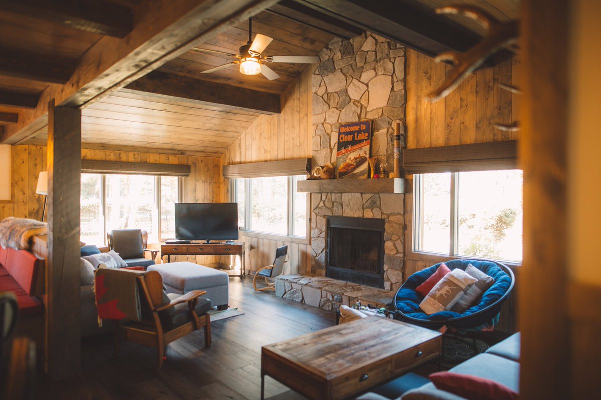 Collyerconstruc's tweet photo. This room is just so classic 'Clear Lake'. Cozy, rustic and full of history.  Custom fireplace with mantle and beam work by Collyer Construction. https://t.co/SBKIWmagt7