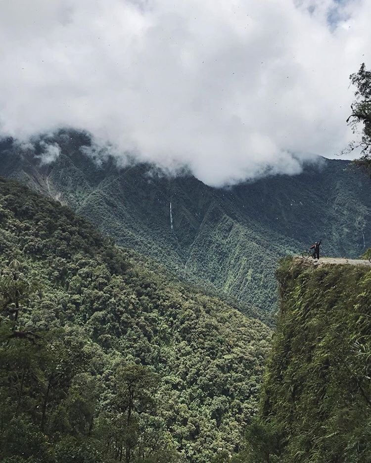 thetraveltwo's tweet photo. 🙋🏼‍♀️ from Death Road in Bolivia. Can you spot me? https://t.co/h8AO79xW5K
