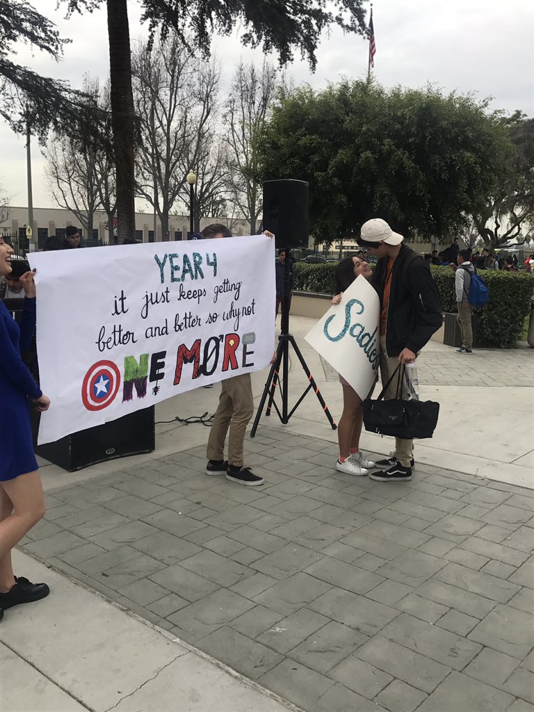priscillanramos's tweet photo. After 4yrs of asking you'd think he wouldn't be surprised 😂 but this proposal was by far the most spectacular, each poster was decorated to match the theme of each year I have asked him and each time he has made me the luckiest girl and said yes 😊💗 #SADIES2018 https://t.co/Q7Lrx9xkYb