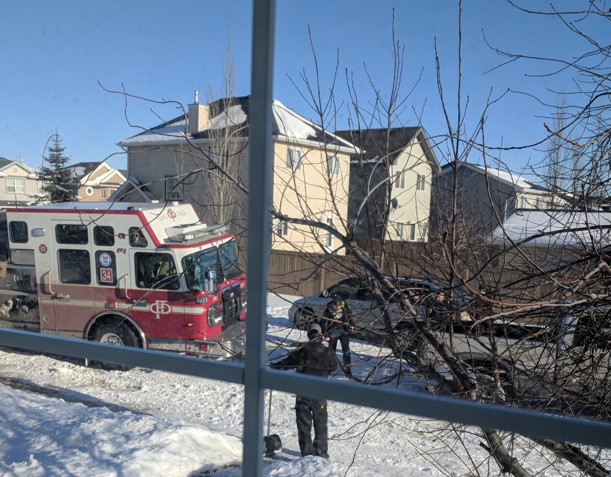 krystadc's tweet photo. You know #YYC has a snow removal issue when citizens pull our fire trucks out of gutters! 😂 @cityofcalgary #yycsnow #yycroads https://t.co/JIVZeubsW6