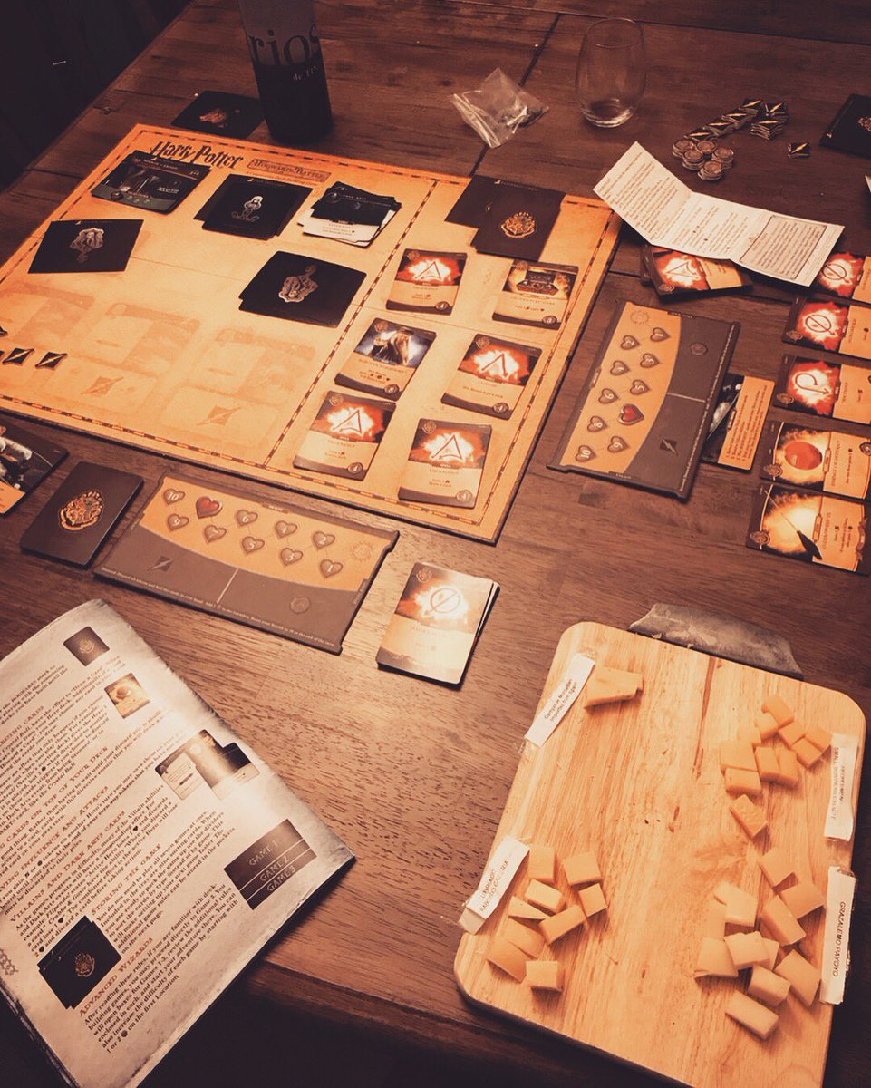 JaxMcGoo's tweet photo. Yes, @3vil3mpir3 and I drink wine, eat cheese, and play Harry Potter-themed cooperative deck-building games on weeknights. What of it? #harrypotter #nevilleandronforthewin #somanyalohomoraspells https://t.co/9Dl1IcrB9n