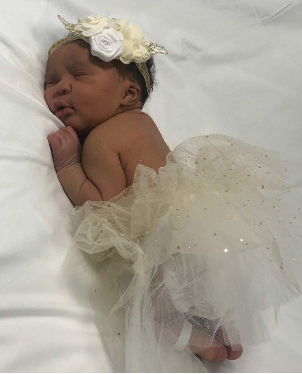 She's sooooo cute. I need a baby mama so we can make mocha babies.