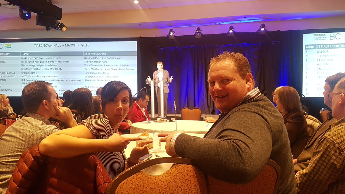 cnicolson's tweet photo. Whitewater Ski Resort's Rebeckah Hornung and Craig Bolt from Gougeon Insurane paying close attention to our tourism boss Walt Judas #BCTIC https://t.co/pZCe2jA9Ng