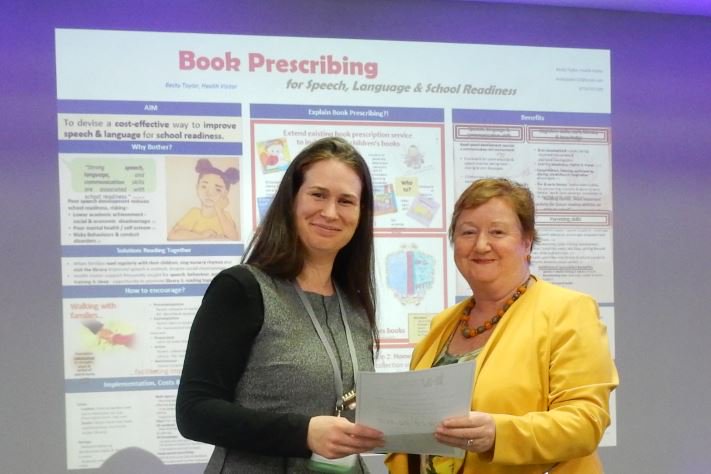 iHealthVisiting's tweet photo. Many congrats to the winner of the poster competition at #iHVconf18  
 - Becky Taylor (a newly-qualified HV in #Manchester ) for an excellent poster on Book Prescribing for Speech, Language and School Readiness - clearly presented innovation, working across boundaries https://t.co/yMZsMQYF7Z
