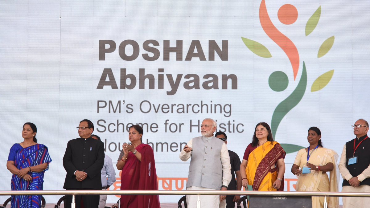 narendramodi's tweet photo. We began the POSHAN Abhiyaan with an unwavering commitment to ensure proper nutrition facilities for our women and children. India will progress when our youth and Nari Shakti are healthy. Here is my speech at Jhunjhunu, Rajasthan today. https://t.co/CPfFzj9E6H https://t.co/kYoF625uL3