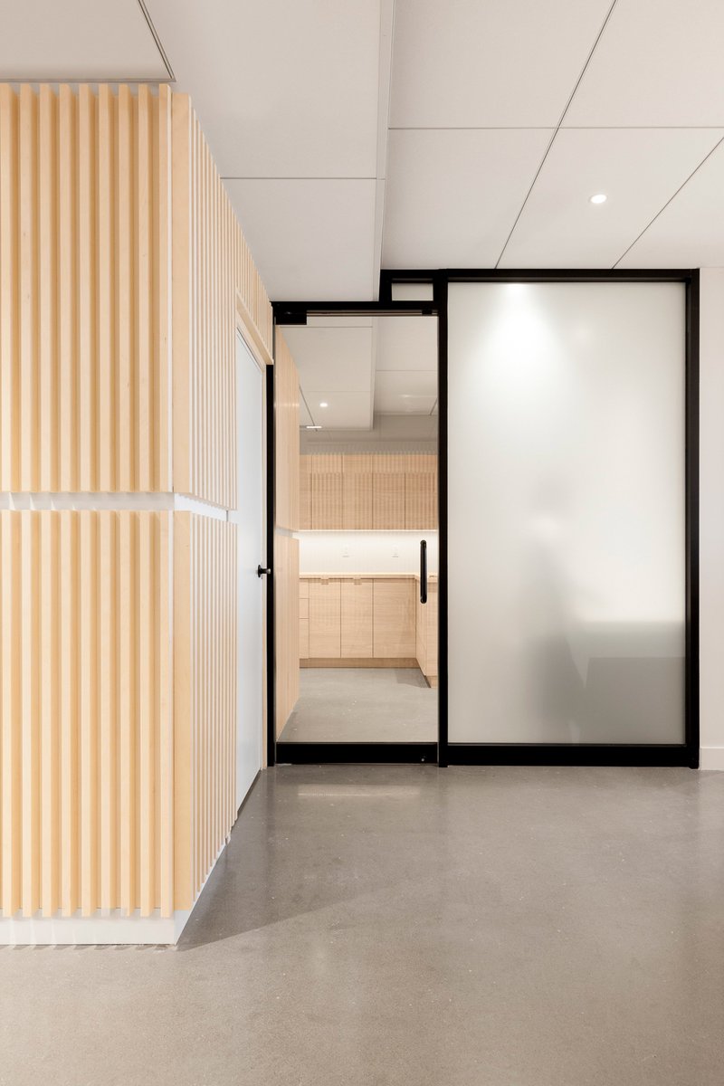 oartgroup's tweet photo. Slatted wood panels and ambient lighting are intended to make visitors feel more at ease at this orthodontist practice in Canada, by designer Natasha Thorpe. https://t.co/Xren34dza6