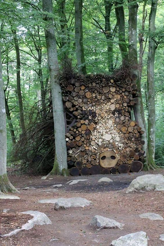 Interesting stacked wood #Logpile. Great way of using nature in #Landart