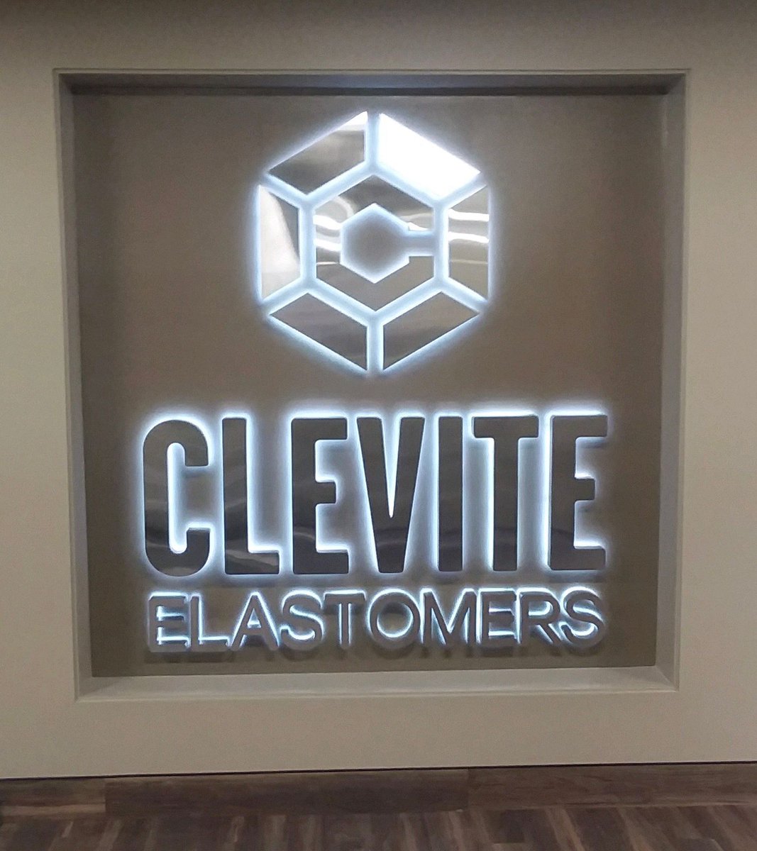 Tenneco Inc. in Milan, OH. Eye catching stainless steel halo-lit interior letter set.  Access behind wall was a bit of a challenge but nothing our skilled install team couldn't handle! #IndustrialChic #LobbySigns #OurSignsMeanBusiness