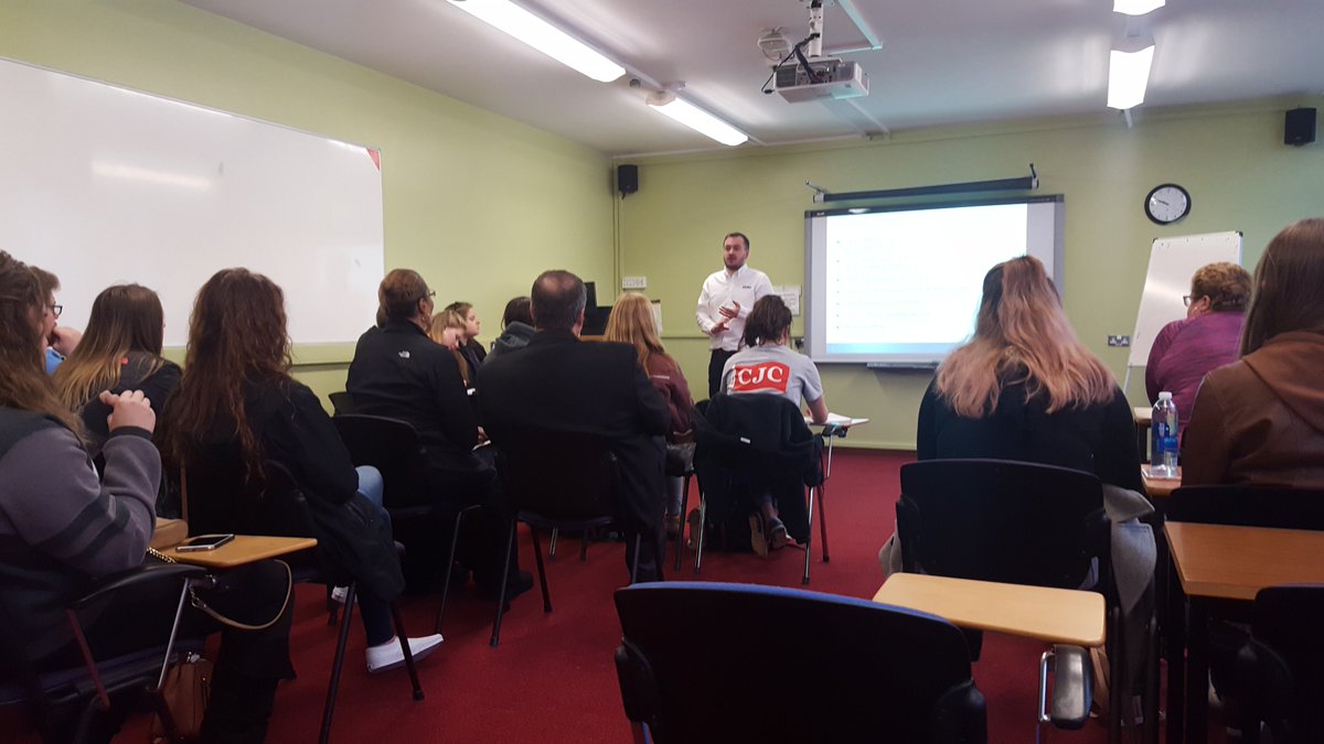 KeeleGlobalEd's tweet image. Ball State and UNCW students enjoying a talk on Forensics, with one of them playing dead to demonstrate the body scanner