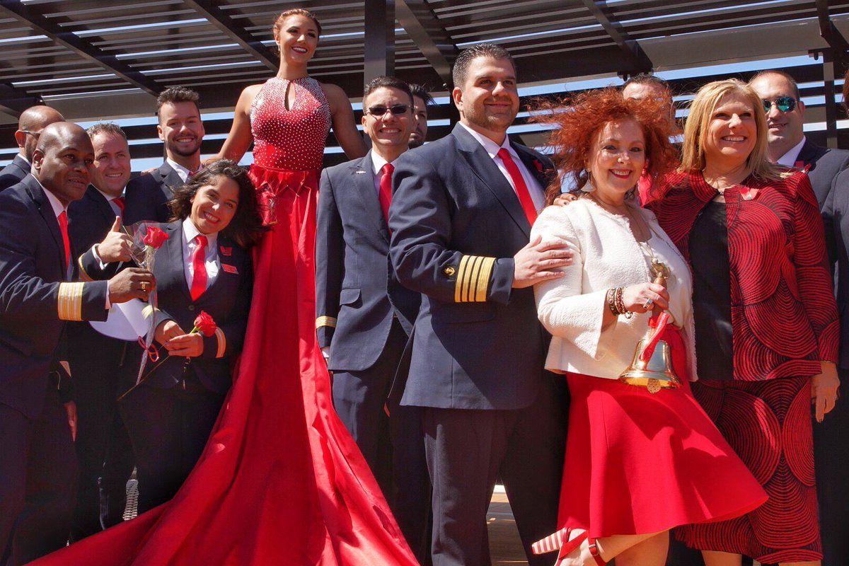 CelebrityCruise's tweet photo. Today, in honor of #IWD2018, each ship in our fleet will come together for the first-ever “Ring the Bell on the Seven Seas” initiative, led by our President &amp; CEO, @LisaLutoffPerlo 

Join us and the @RedShoeMovement in celebrating hard-working women around the globe. #IWDLeader https://t.co/Ax1izD6hU8