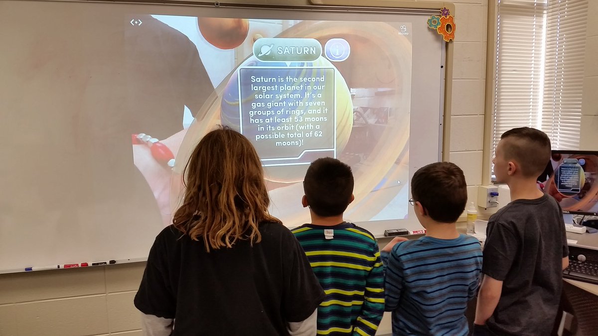 Looking at merge cube solar system!