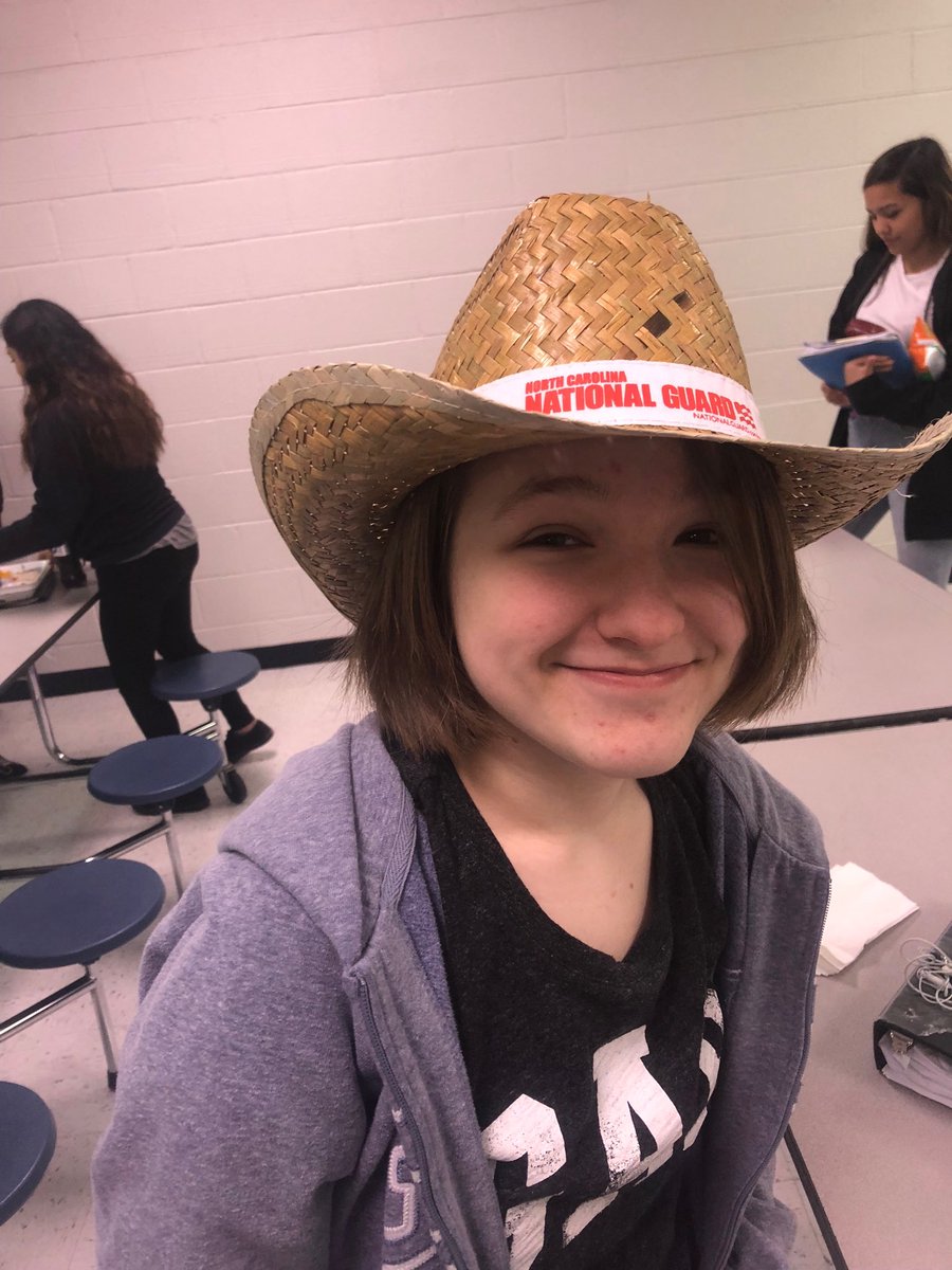 AecMcdowell's tweet photo. She mastered the push-up challenge and won a cool prize. The National Guard was on campus this morning and students learned about ASVAB, college options, and careers in the military. Many thanks to the National Guard for their energy and enthusiasm! #nationalguard #winner #hat https://t.co/3QKQn3AiXW